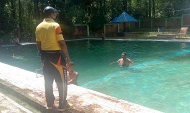 Bhabinkamtibmas-Desa-Bijeli-Pantau-Aktivitas-di-Obyek-Wisata-Oeluan